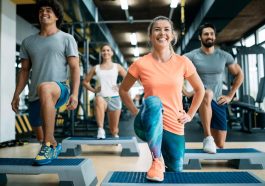 group fitness training young adults gym strength exercise